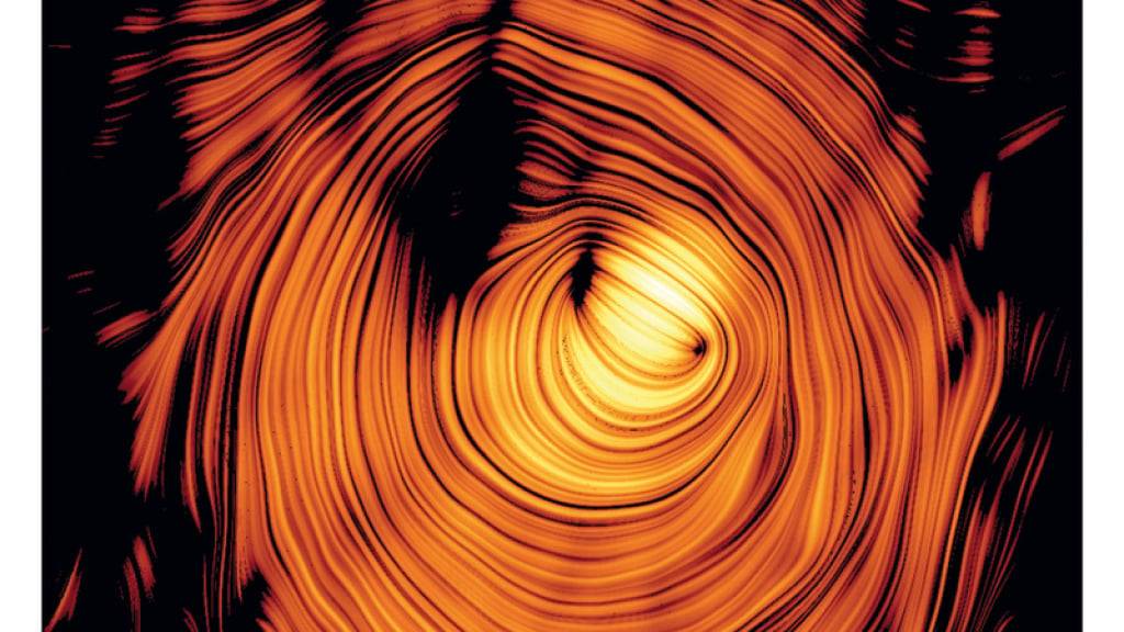 Das «Auge von Sauron» - ein Bild des Plasmastrahls im Blazar PKS 1424+240, direkt von vorne gesehen. Der Strahl wird von einem nahezu perfekten ringförmigen Magnetfeld (in Orange dargestellt) durchzogen.