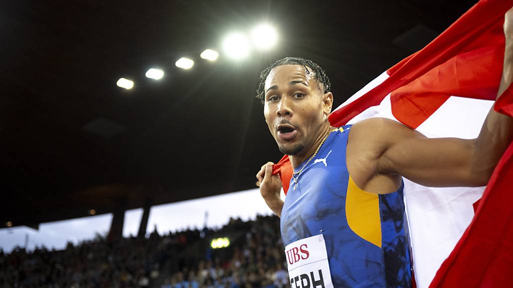 Auf der Ehrenrunde mit der Schweizer Flagge: Jason Joseph