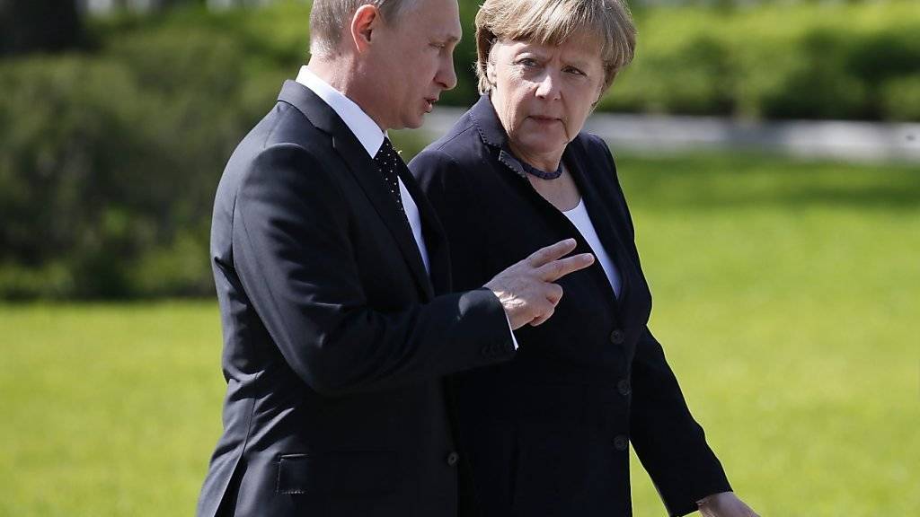 Der russische Präsident Wladimir Putin und die deutsche Kanzlerin Angela Merkel werden am Mittwoch in Berlin über die Ukraine-Krise diskutieren. (Archiv)