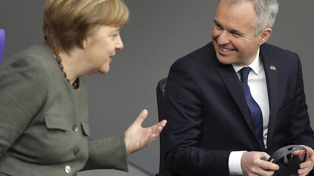 Die deutsche Bundeskanzlerin Angela Merkel und der französische Parlamentspräsident François de Rugy anlässlich der Feier zum 55. Jubiläum des Elysée-Vertrags im Reichstag in Berlin.