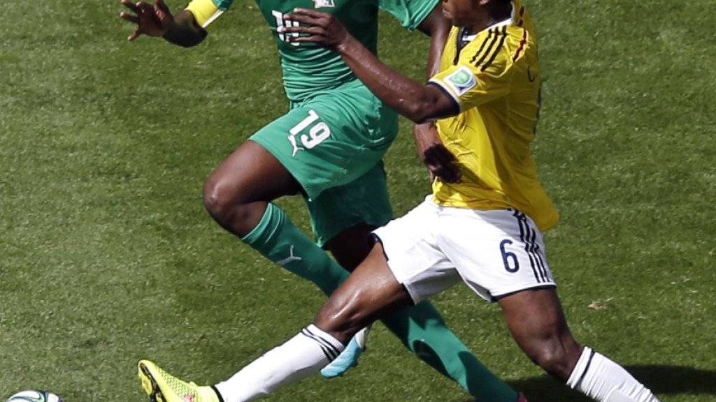 Mittelfeldspieler Yaya Touré (links) tritt aus der Nationalmannschaft der Elfenbeinküste zurück