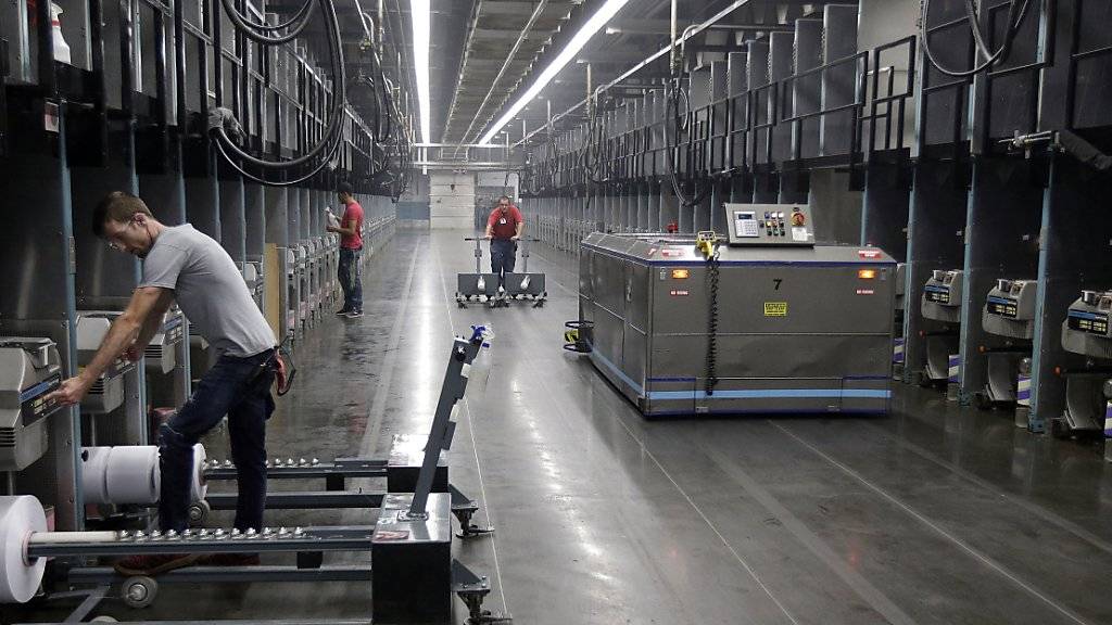Teilautomatisierte Recyclingfabrik in den USA: Neun Prozent der Arbeitsplätze in den OECD-Ländern könnten in den kommenden Jahren automatisiert werden. Weitere 25 Prozent könnten sich massiv ändern.