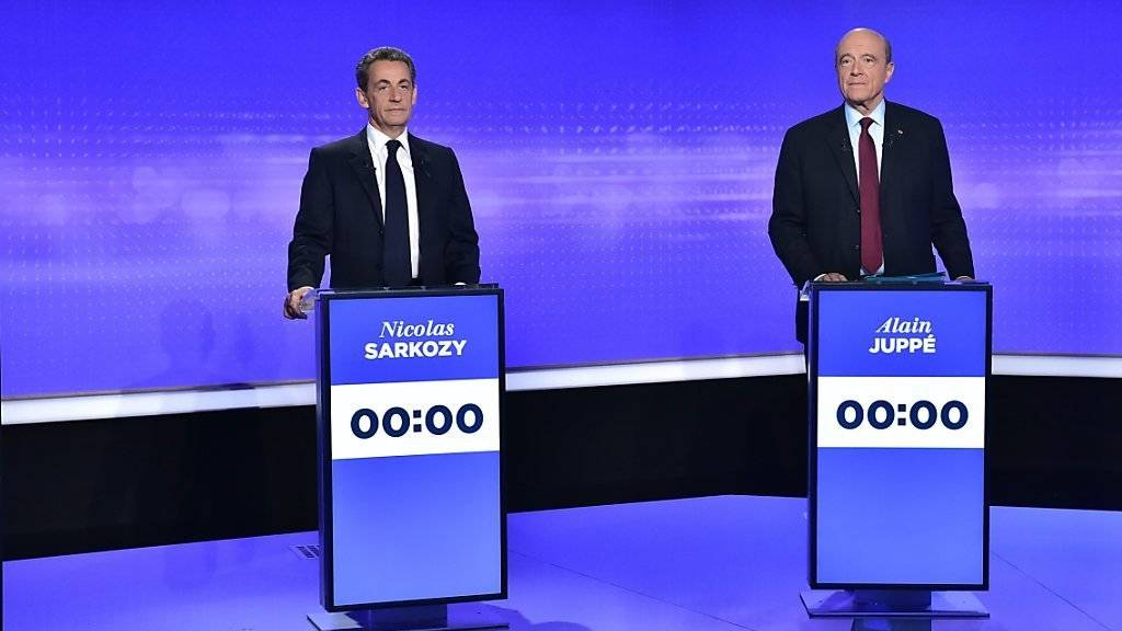 Sie sind die Favoriten für die Präsidentschaftskandidatur bei den französischen Republikanern: Ex-Regierungschef Alain Juppé (rechts) und Ex-Präsident Nicolas Sarkozy.