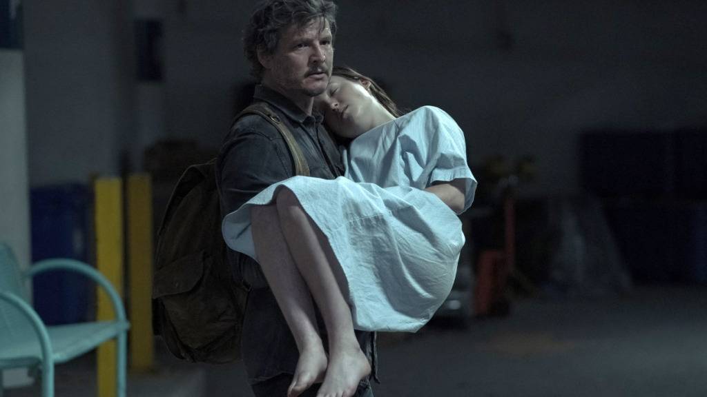 HANDOUT - Dieses von HBO veröffentlichte Bild zeigt Pedro Pascal (l) und Bella Ramsey in einer Szene aus der Serie «The Last of Us». Die Mediensatire «Succession» und die postapokalyptische Serie «The Last of Us» gehen bei den diesjährigen Emmy-Nominierungen mit den meisten Chancen ins Rennen. Foto: Uncredited/HBO/AP/dpa - ACHTUNG: Nur zur redaktionellen Verwendung im Zusammenhang mit einer Berichterstattung über den Film und nur mit vollständiger Nennung des vorstehenden Credits