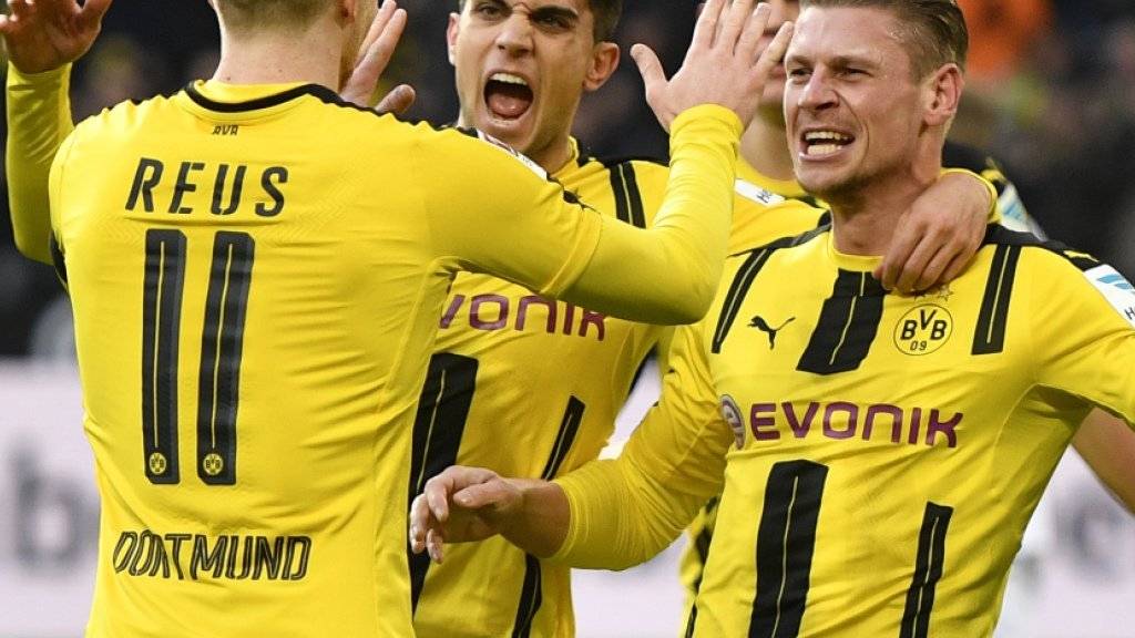 Borussia Dortmund sicherte sich dank einer Aufholjagd beim 2:2 auswärts gegen Real Madrid den Gruppensieg