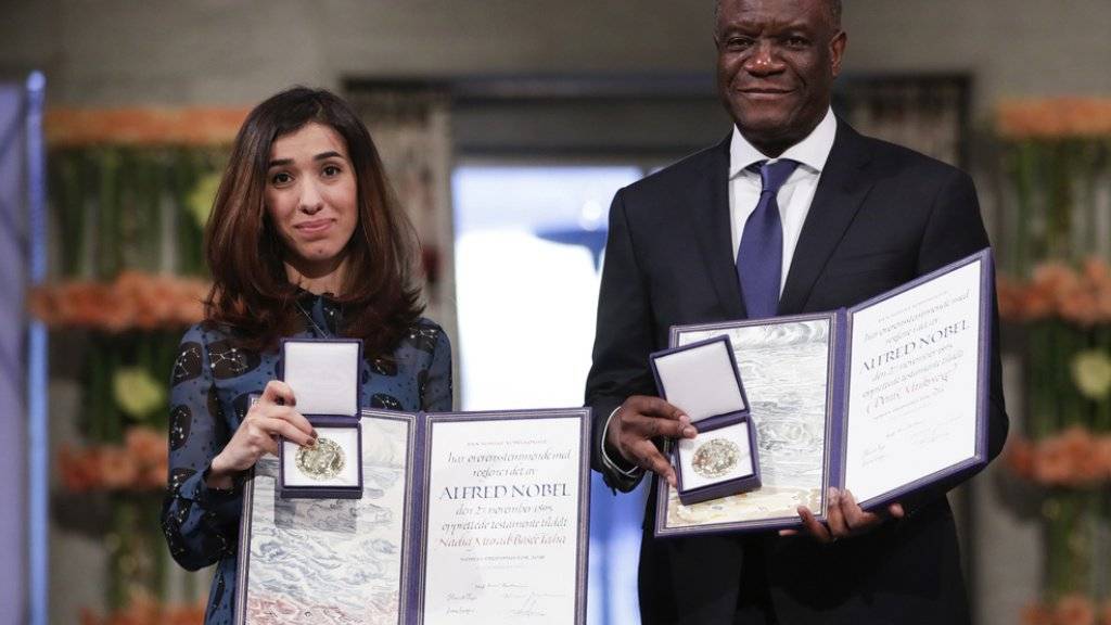 Die jesidische Aktivistin Nadia Murad und der kongolesische Gynäkologe Denis Mukwege am Montag in Oslo mit dem Friedensnobelpreis.