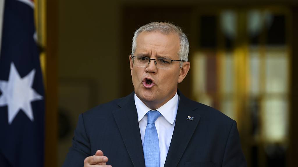 Australian Prime Minister Scott Morrison speaks to the media announcing a 21 May election during a press conference at Parliament House in Canberra, Sunday, April 10, 2022. (AAP Image/Lukas Coch) NO ARCHIVING
