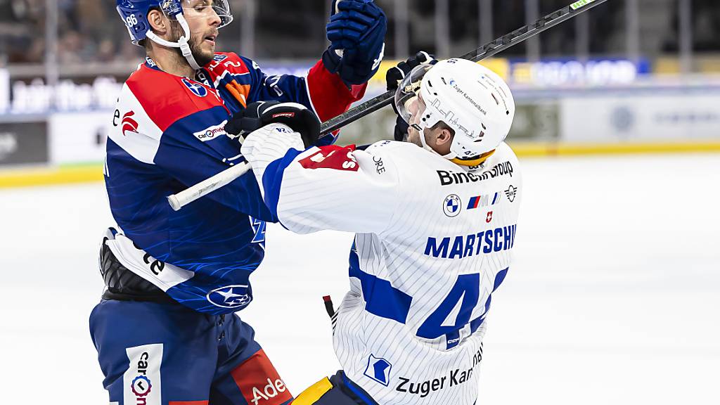 Der Zuger Lino Martschini lehnt sich gegen Zürichs Dario Truttmann auf