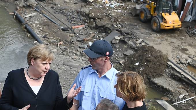 Merkel verspricht Hochwasseropfern Hilfe - Unwetter auch in Bayern