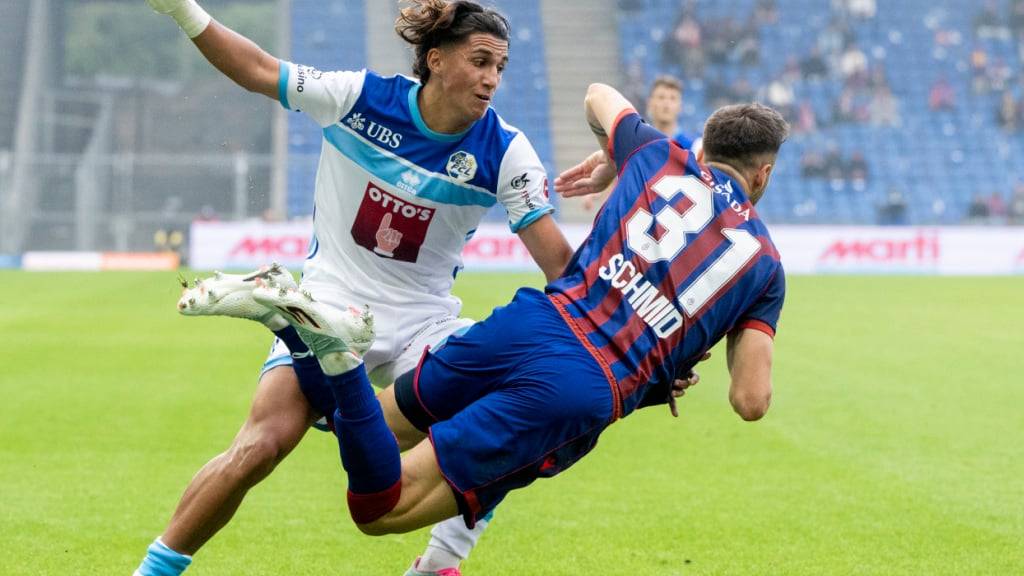 Lucas Ferreira (links) und die Luzerner stellen dem FC Basel mit Dominik Schmid im St.-Jakob-Park ein Bein
