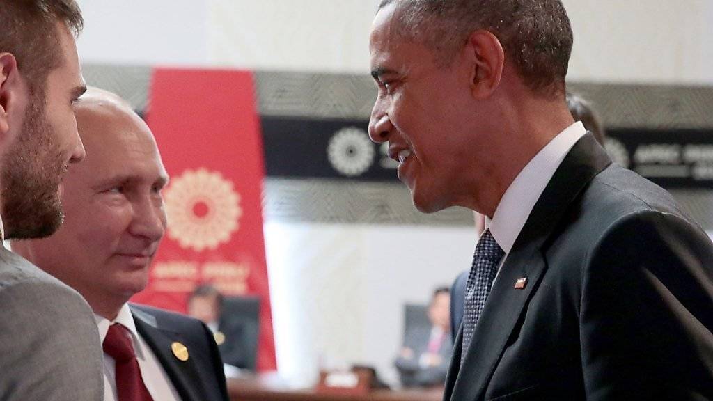 Doch noch ein Lächeln zum Schluss: Russlands Präsident Putin gibt Obama am APEC-Gipfel in Lima eine Willkommensgarantie für die Zukunft.