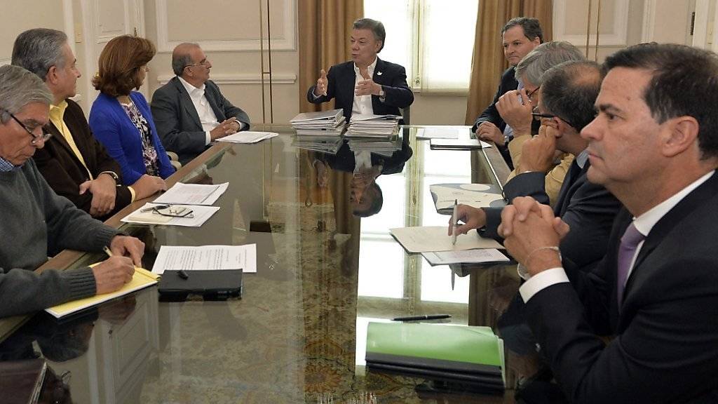 Zurück an den Verhandlungstisch: FARC-Vertreter und die kolumbianische Regierung haben die Friedensgespräche wiederaufgenommen.