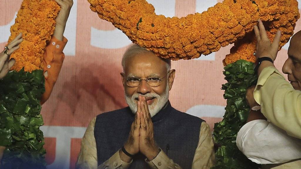 Indiens Premierminister Narendra Modi bekommt mit einem deutlichen Wahlsieg seiner Partei eine zweite Amtszeit.