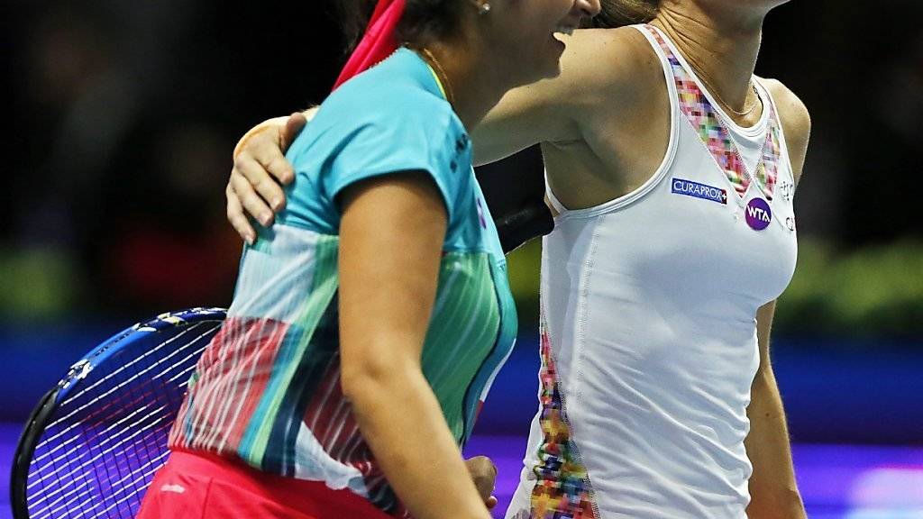 Haben gut lachen: Martina Hingis (re.) und Sania Mirza spielen in Madrid gross auf. (Archivbild)