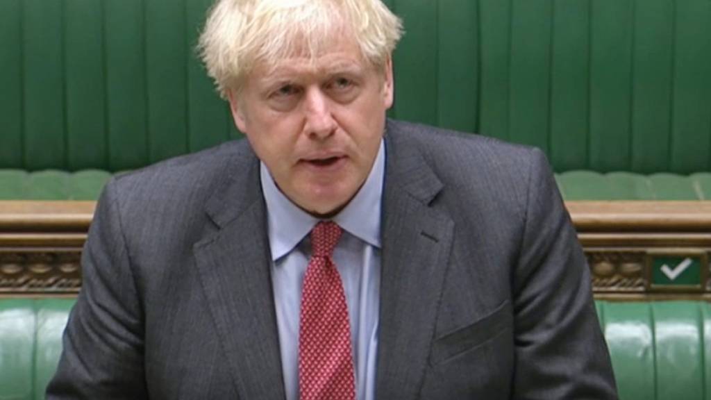 HANDOUT - Boris Johnson, Premierminister von Großbritannien, spricht im britischen Unterhaus vor den Abgeordneten über die nächsten Schritte zur Bekämpfung der Corona-Pandemie (bestmögliche Qualität). Foto: House Of Commons/PA Wire/dpa - ACHTUNG: Nur zur redaktionellen Verwendung im Zusammenhang mit der aktuellen Berichterstattung und nur mit vollständiger Nennung des vorstehenden Credits