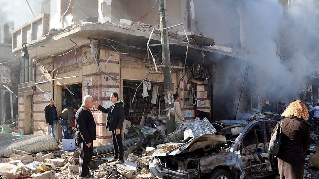 Die syrische Stadt Homs nach einem Anschlag: Der Konflikt in Syrien hat im vergangenen Jahr über 55'000 Menschen das Leben gekostet.
