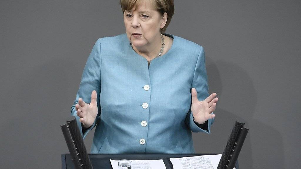 Die deutsche Kanzlerin Angela Merkel warnt vor «Isolationismus und Protektionismus» und stellt sich hinter das Klimaabkommen.