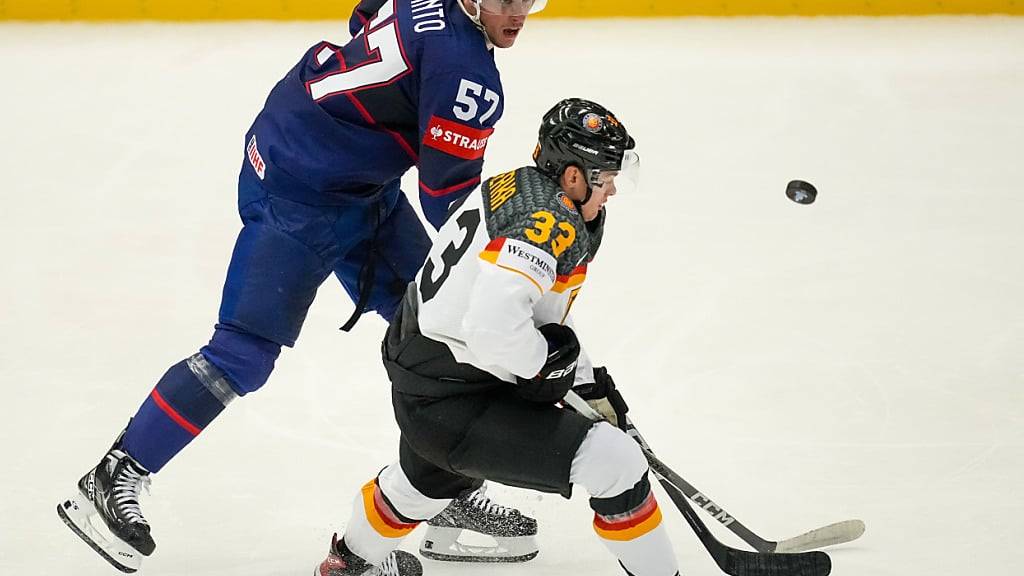 John Peterka (rechts) ist mit fünf Toren und vier Assists der beste deutsche Skorer der Vorrunde