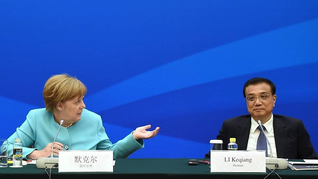 Bis Ende Jahr soll eine Lösung bei der Anerkennung Chinas als Marktwirtschaft gefunden werden, sagten Merkel und Li in Peking.