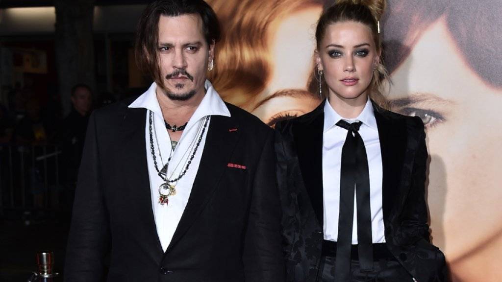 Werden beide vor Gericht in Australien erwartet wegen zweier Hunde: Johnny Depp und Amber Heard (Archiv)