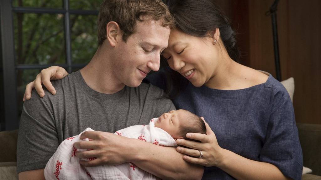 Mark Zuckerberg und seine Frau Priscilla Chan mit ihrem ersten Kind Max. (Archiv)