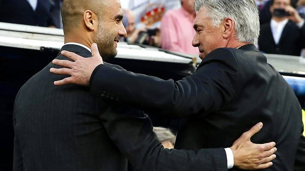 Carlo Ancelotti (rechts) soll angeblich die Nachfolge von Pep Guardiola als Bayern-Trainer antreten
