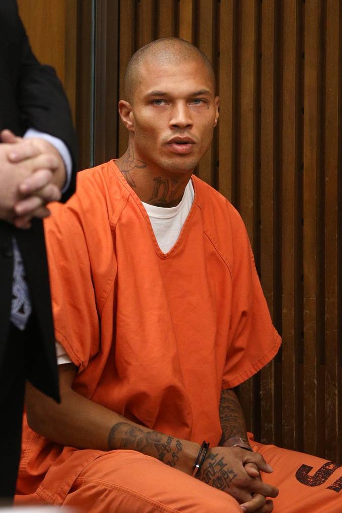 STOCKTON, CA - JULY 08:  Jeremy Meeks, right, makes a court appearance with his attorney Tai Bogan July 8, 2014 in Stockton, California. During his brief appearance the state agreed to let federal prosecutors take over Meeks' case. Meeks was arrested on felony weapon charges June 18 as part of a Stockton police gang sweep.  His booking photo was posted to the Stockton police Facebook page and has garnered media attention and secured him a Hollywood agent due to his model-like features.  (Photo by Elijah Nouvelage/Getty Images)