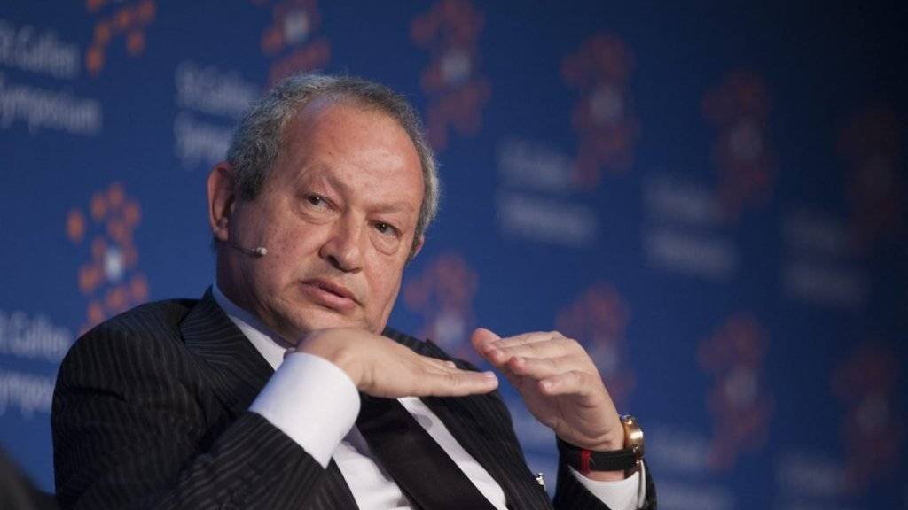 Der ägyptische Milliardär Naguib Sawiris - hier 2013 am 43. St. Gallen Symposium - möchte Gutes tun für Flüchtlinge, aber keiner lässt ihn (Archiv).