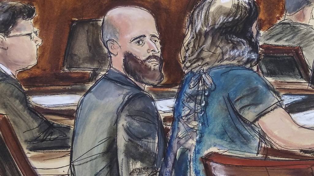 ARCHIV - In dieser Skizze aus dem Gerichtssaal sitzt der damals Angeklagte (M.) am Tisch der Verteidigung. Foto: Elizabeth Williams/AP/dpa - ACHTUNG: Nur zur redaktionellen Verwendung und nur mit vollständiger Nennung des vorstehenden Credits