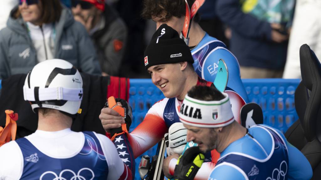 Franjo von Allmen wird vor Giovanni Franzoni und Dominik Paris Olympiasieger