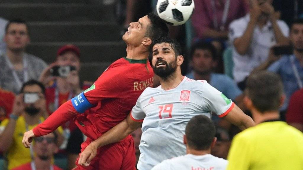 Diego Costa (rechts) und Cristiano Ronaldo (links) haben ihre Treffsicherheit in ihrem ersten WM-Spiel in Russland bewiesen. Beim 3:3 im Direktduell traf Ronaldo für Europameister Portugal dreifach, Costa für Spanien doppelt