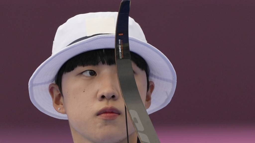 Der modische Hut tarnt bei Triple-Goldgewinnerin An San aus Südkorea den feministischen Kurzhaarschnitt, für den sie in der Heimat kritisiert worden ist