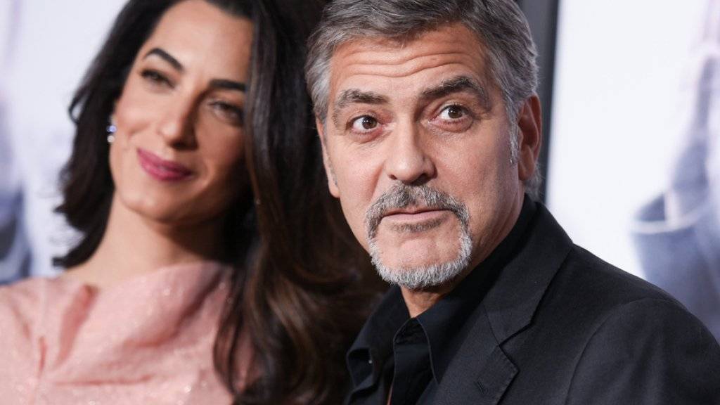 George Clooney und Amal Clooney sollen sich im englischen Sonning ein Anwesen gekauft haben (Archiv)