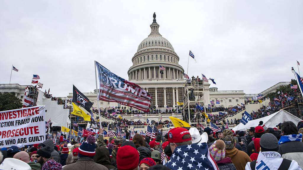 In der am Mittwoch veröffentlichten Analyse werden die ökonomischen Kosten politischer Unruhen in sieben Ländern seit 2018 auf über 13 Milliarden Dollar beziffert. Im Bild: Sturm auf das US-Kapitol in Washington D.C. am 6. Januar 2021. (Archivbild)