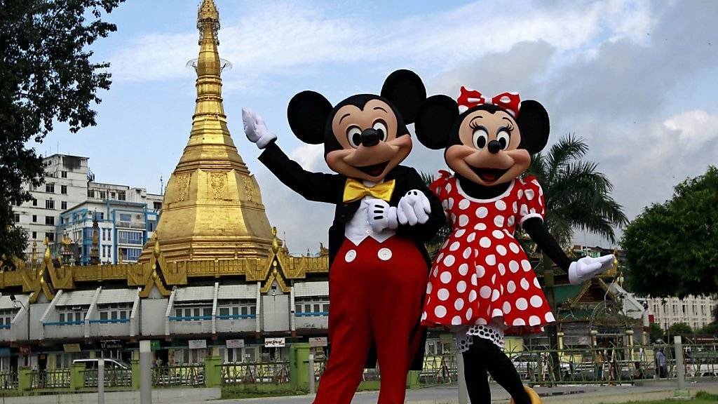 Die Disney-Stars, hier Mickey und Minnie Mouse in Rangun, Burma, sorgten beim Unterhaltungskonzern für einen saftigen Gewinn. (Archivbild)