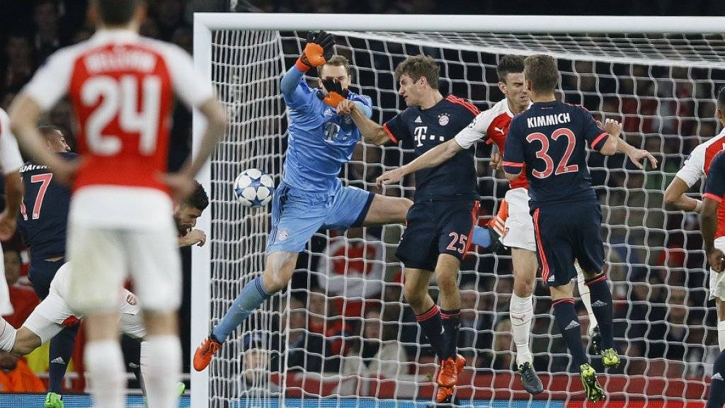 Arsenals Olivier Giroud (verdeckt) trifft zum 1:0 gegen Bayern München.