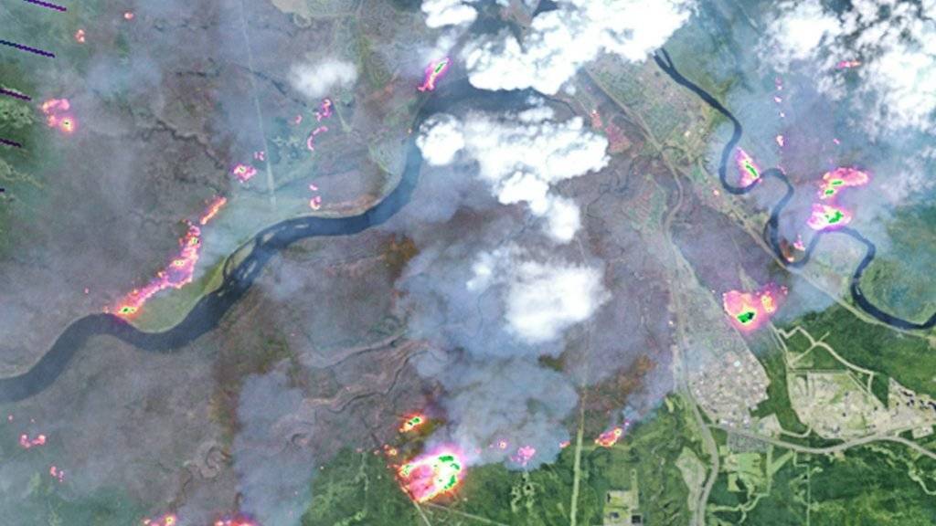 So sehen die Waldbrände in Kanada aus dem Weltall aus: Leichter Regen lässt die Feuerwehr etwas aufatmen im Kampf gegen die Flammen.