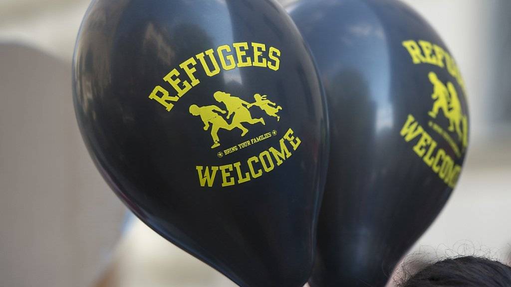 Ballone mit dem Aufdruck «Refugees Welcome» - der Slogan ist in Deutschland zum Anglizismus des Jahres gewählt worden. (Archiv)