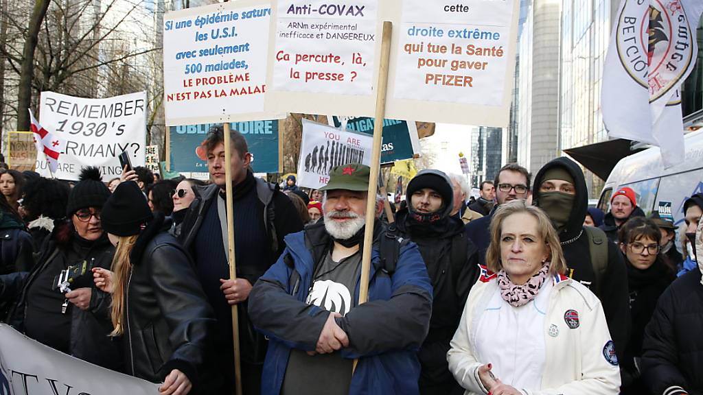 Protestteilnehmer in Brüssel. Foto: Nicolas Maeterlinck/BELGA/dpa