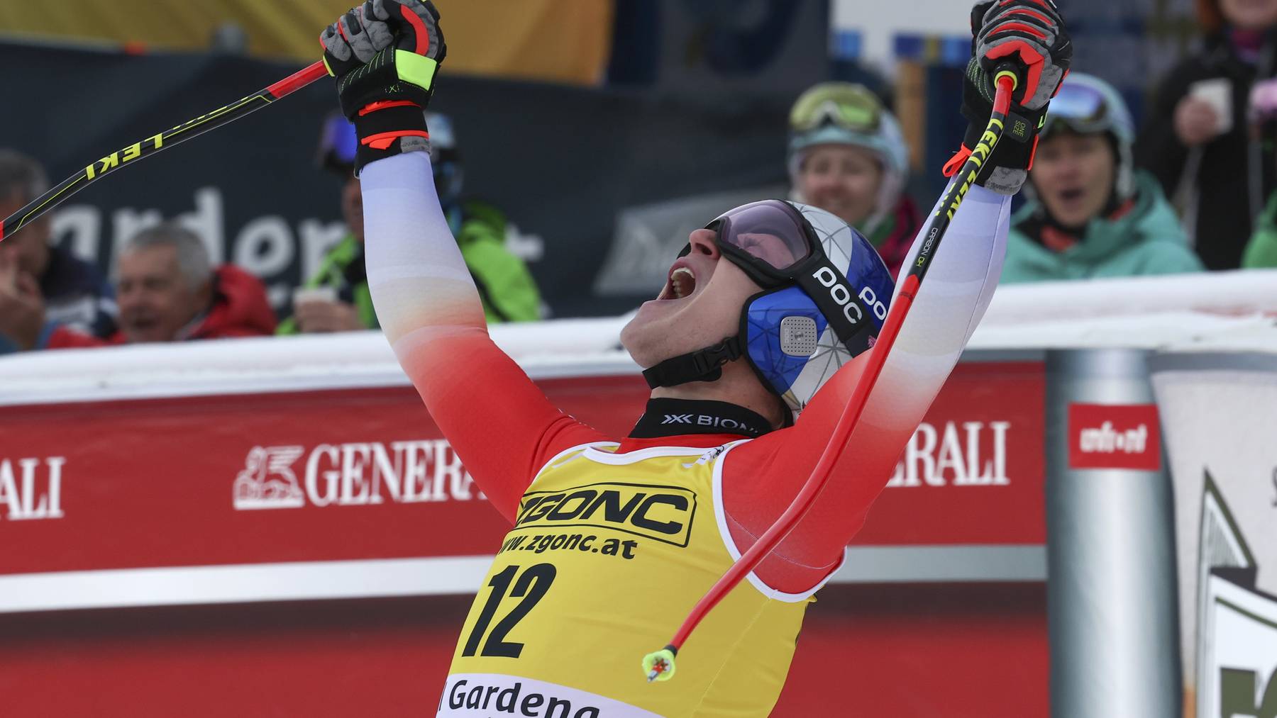 Switzerland's Marco Odermatt celebrates at the finish area of an alpine ski, men's World Cup downhill, in Val Gardena, Italy, Thursday, Dec.15, 2022.