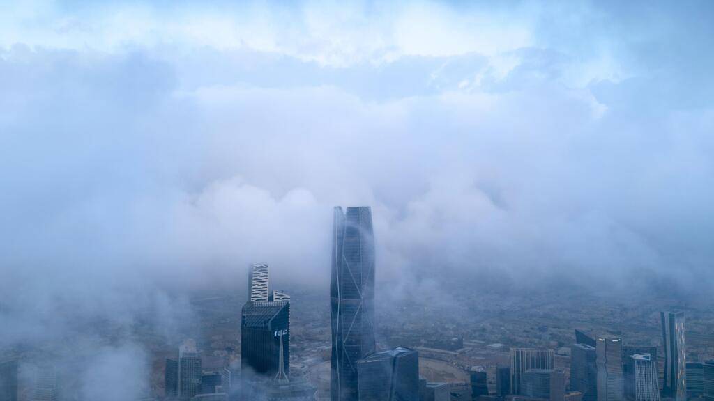ARCHIV - Wolken hängen über der Skyline von Riad. Foto: --/Saudi Press Agency/dpa