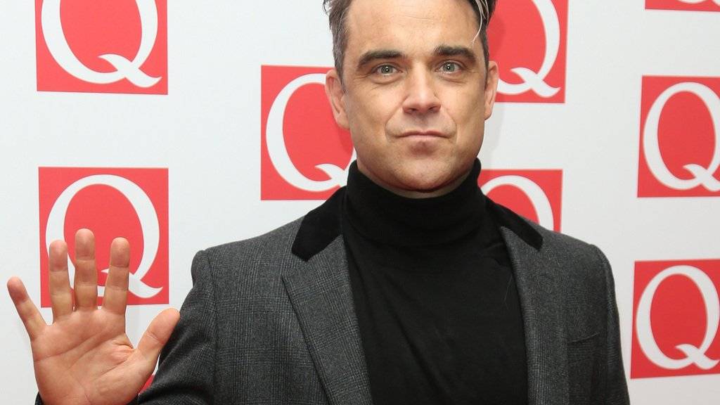 Der britische Popstar Robbie Williams muss Abschied nehmen: Sein langjähriger Manager David Enthoven ist nach schwerer Krankheit gestorben. (Archivbild)