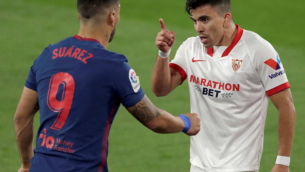 Sevilla-Verteidiger Marcos Acuña ermahnt Atléticos Luis Suarez - und trifft später zum Sieg