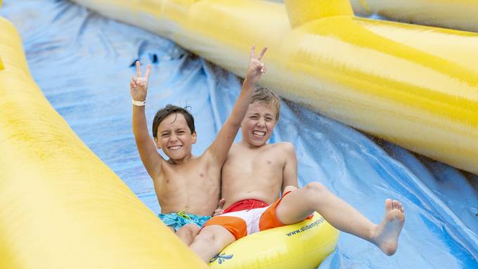 Fröhliche Gesichter beim Slide my City