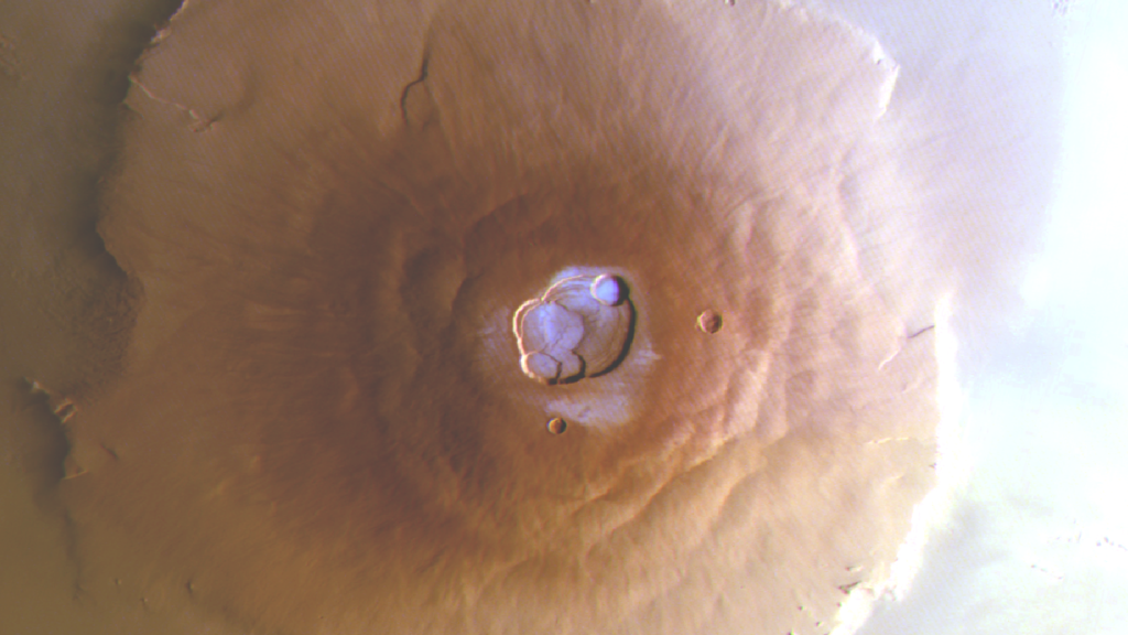 Der Olympus Mons, der höchsten Vulkan – nicht nur auf dem Mars, sondern im gesamten Sonnensystem. Das Bild wurde von der Stereo Kamera an Bord des ESA-Satelliten Mars Express aufgenommen.