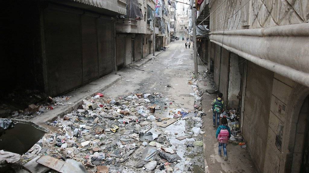 Kinder in den Strassen von Aleppo, einer der Städte, die unter dem Krieg in Syrien leiden.