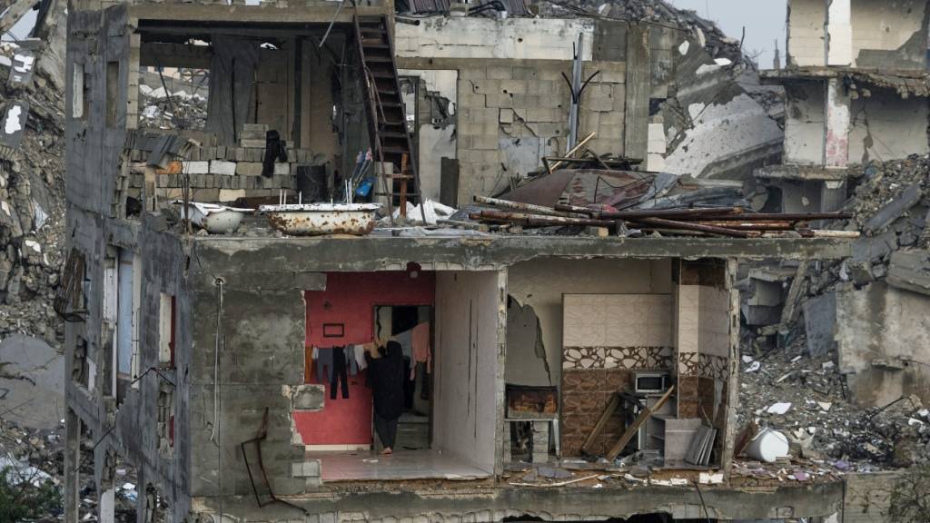 ARCHIV - Zerstörte Wohngebäude in Gaza. Foto: Jehad Alshrafi/AP/dpa/Archivbild