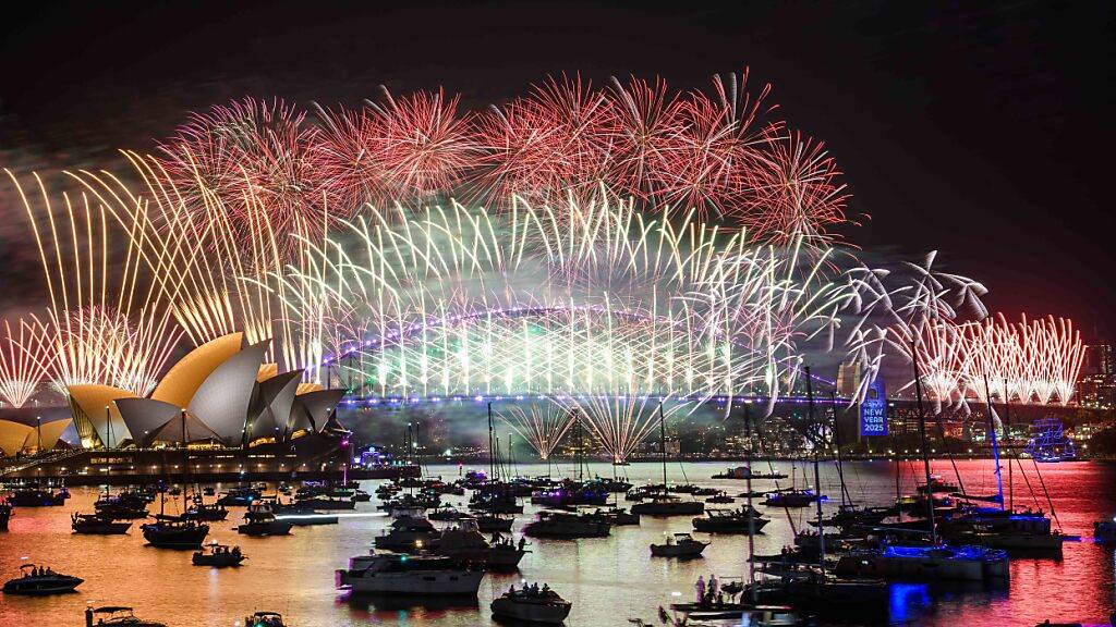 Feuerwerk über dem Sydney Opera House und der Harbour Bridge während der Silvesterfeierlichkeiten. Foto: Bianca De Marchi/AAP/dpa