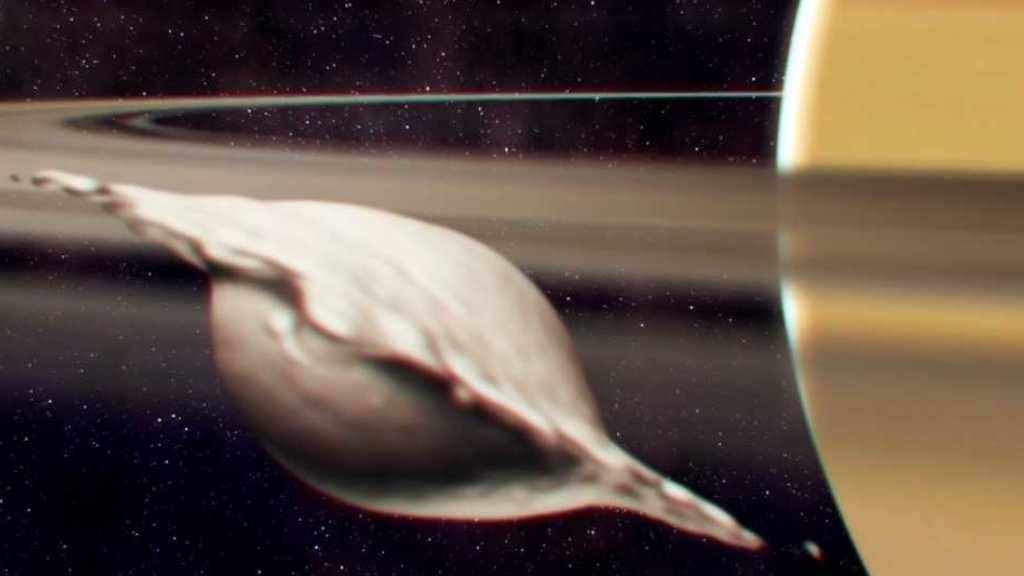 Entstehung von Atlas, einem der kleinen, inneren Monde des Saturns. Seine flache, ravioliartige Form kam bei der Kollision und Verschmelzung zweier gleich grosser Körper zustande. Die Illustration zeigt einen Moment, bevor die Neuausrichtung des Mondes aufgrund der Gezeiten abgeschlossen ist.