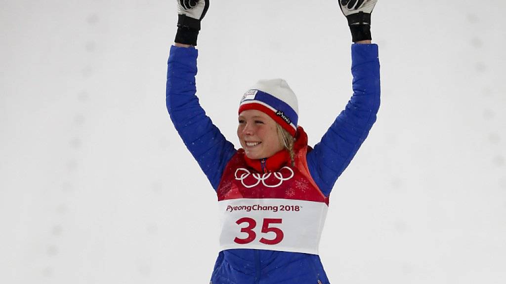 Maren Lundby jubelt über ihren Olympiasieg.